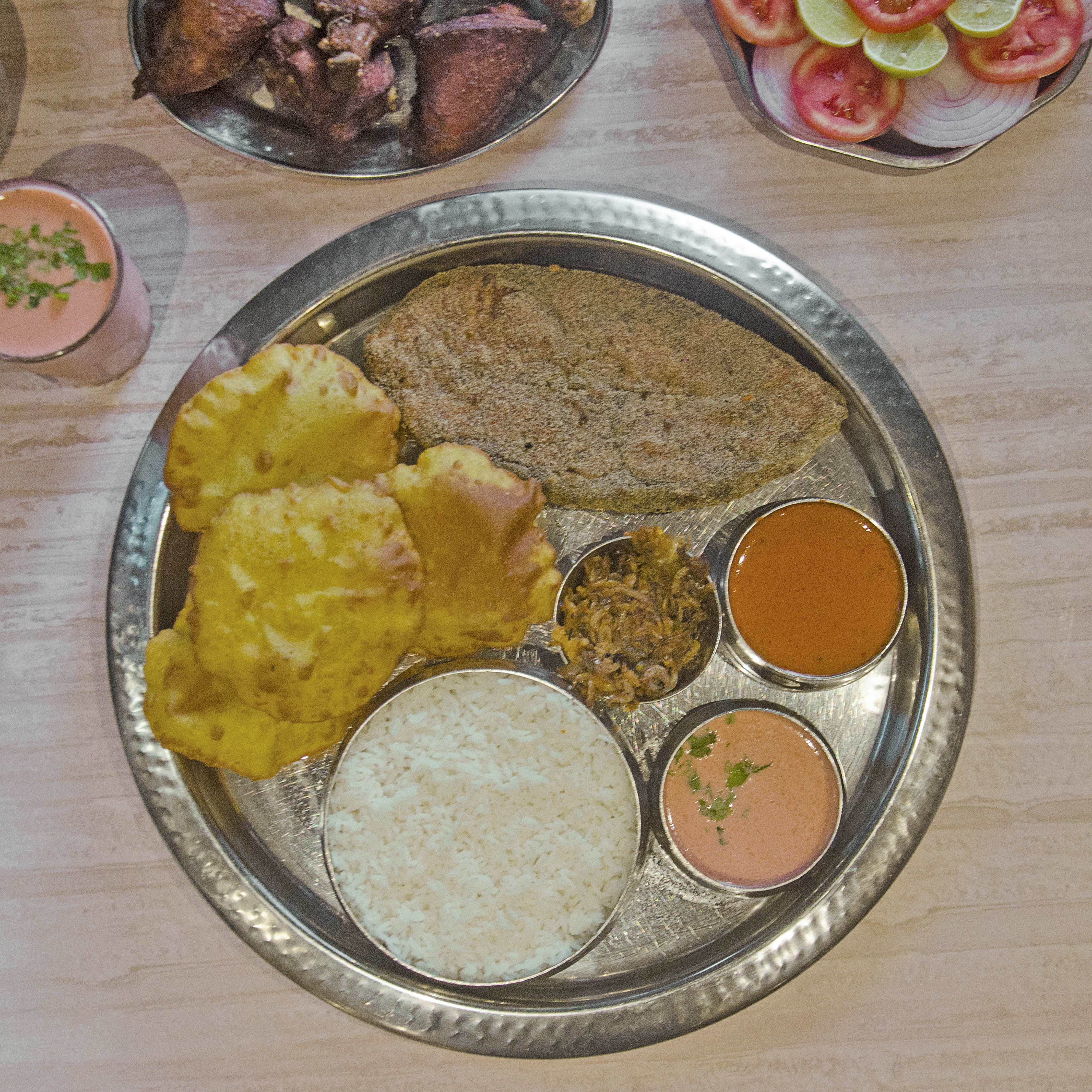 Gomantak - Logo