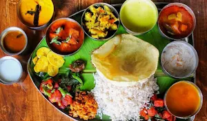 Gowri Tiffen Home & Snacks - Logo