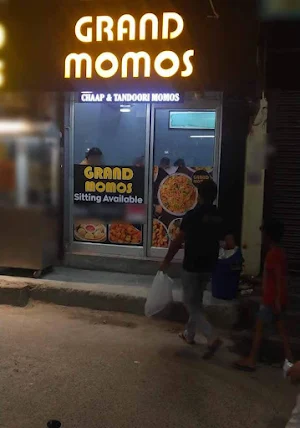 Grand Momos - Logo