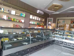 Gulab Ji Sweets & Restaurant - Logo