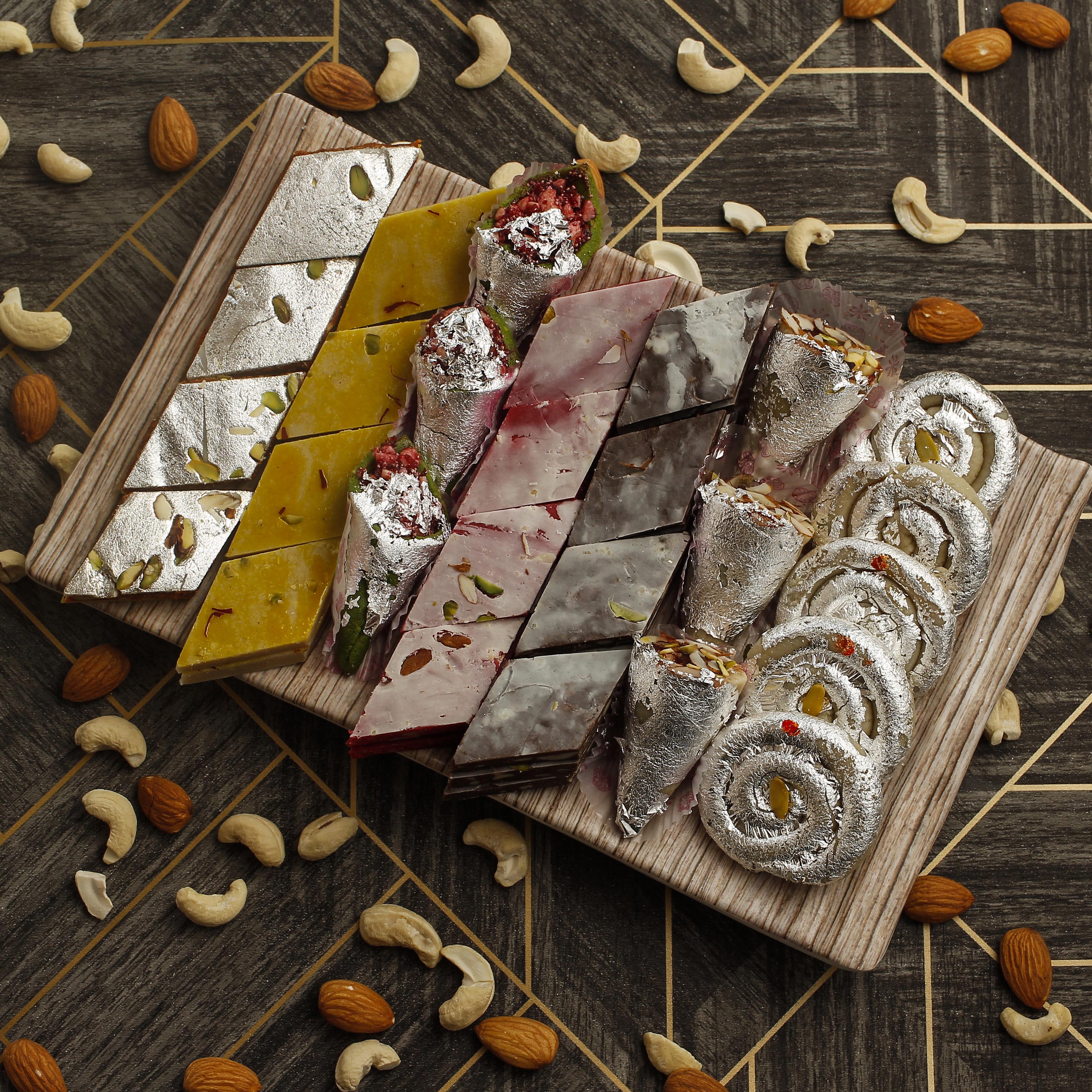Gulmohur sweets and bakery - Logo