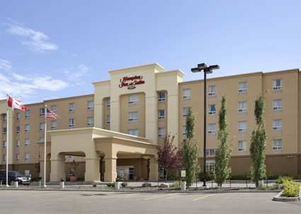 Hampton Inn &a; Suites by Hilton Edmonton/West - Logo