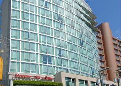 Hampton Inn &a; Suites by Hilton Vancouver-Downtown - Logo