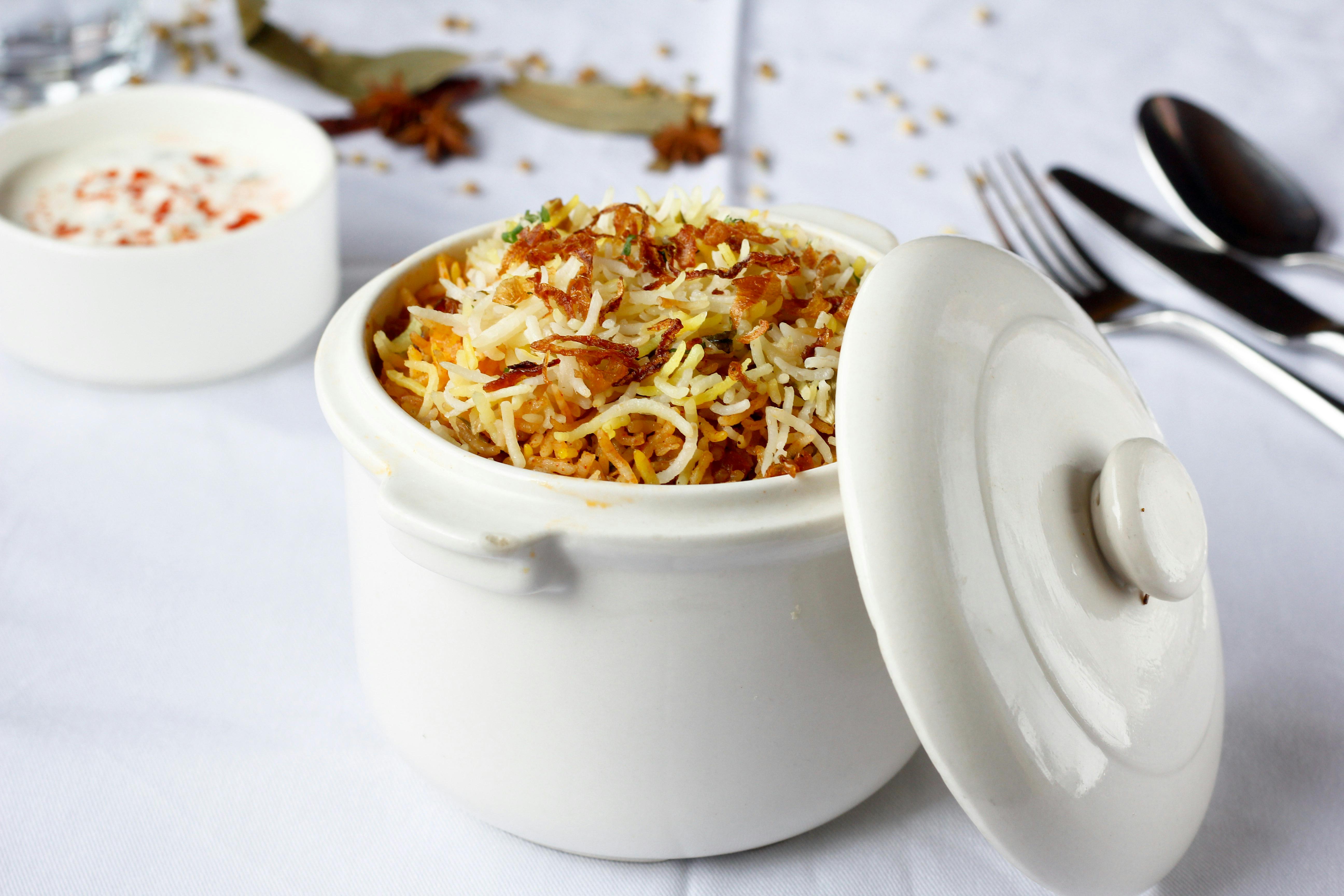 HANDIWALA the biryani house - Logo