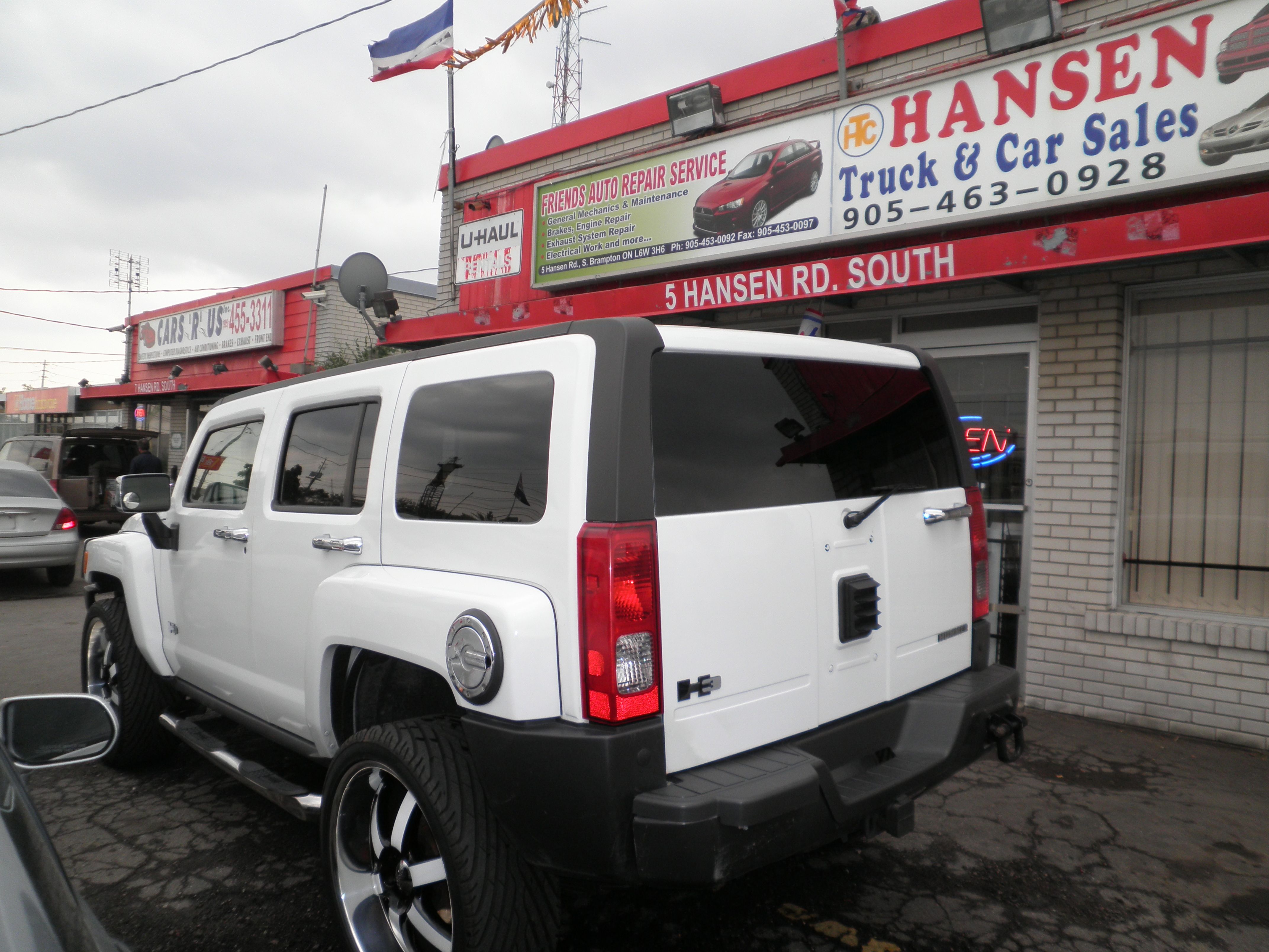 Hansen Truck and Car Sales - Logo