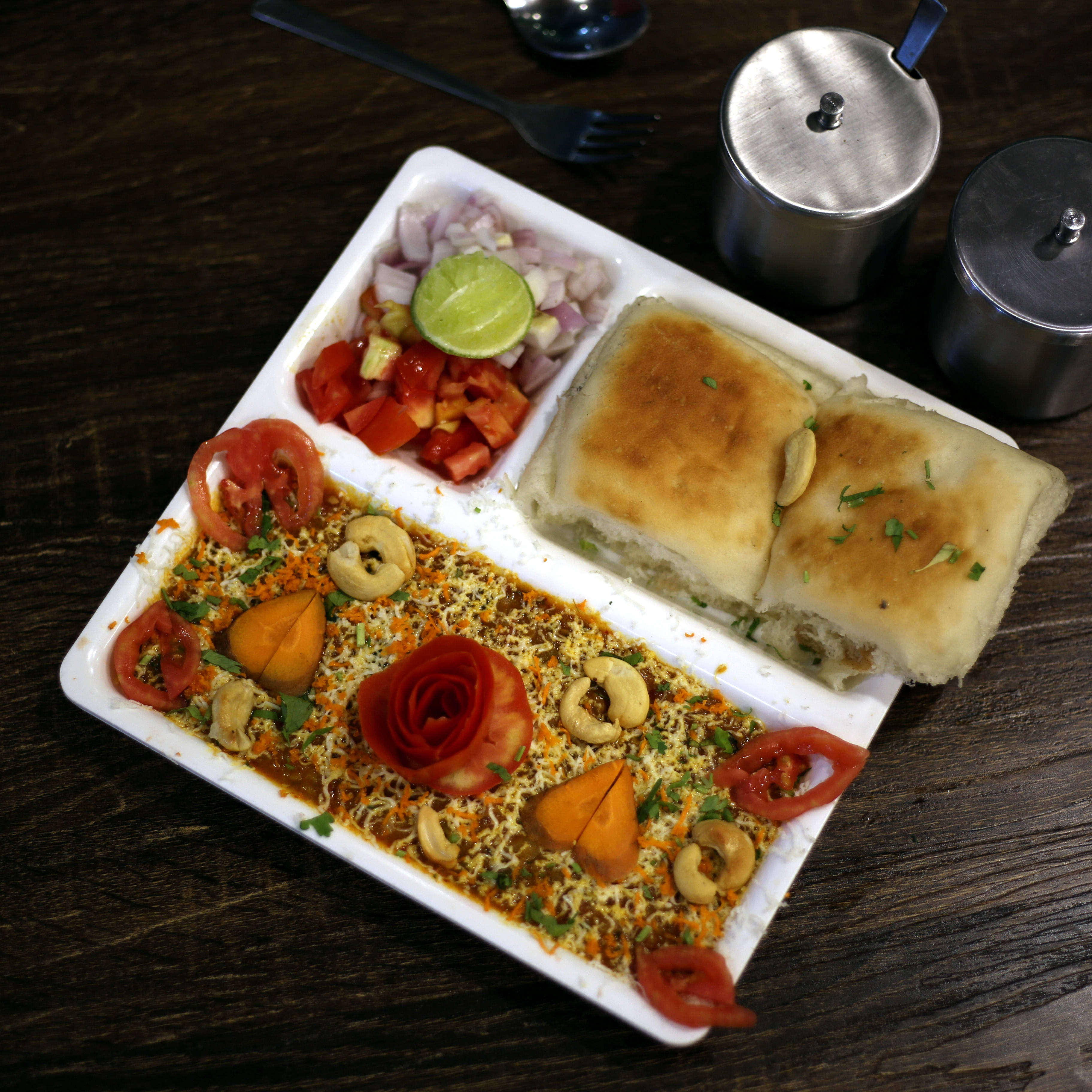 Hariom Kathiyawadi & Punjabi Restaurant - Logo