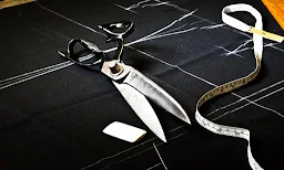 H Choudhary Tailors - Logo