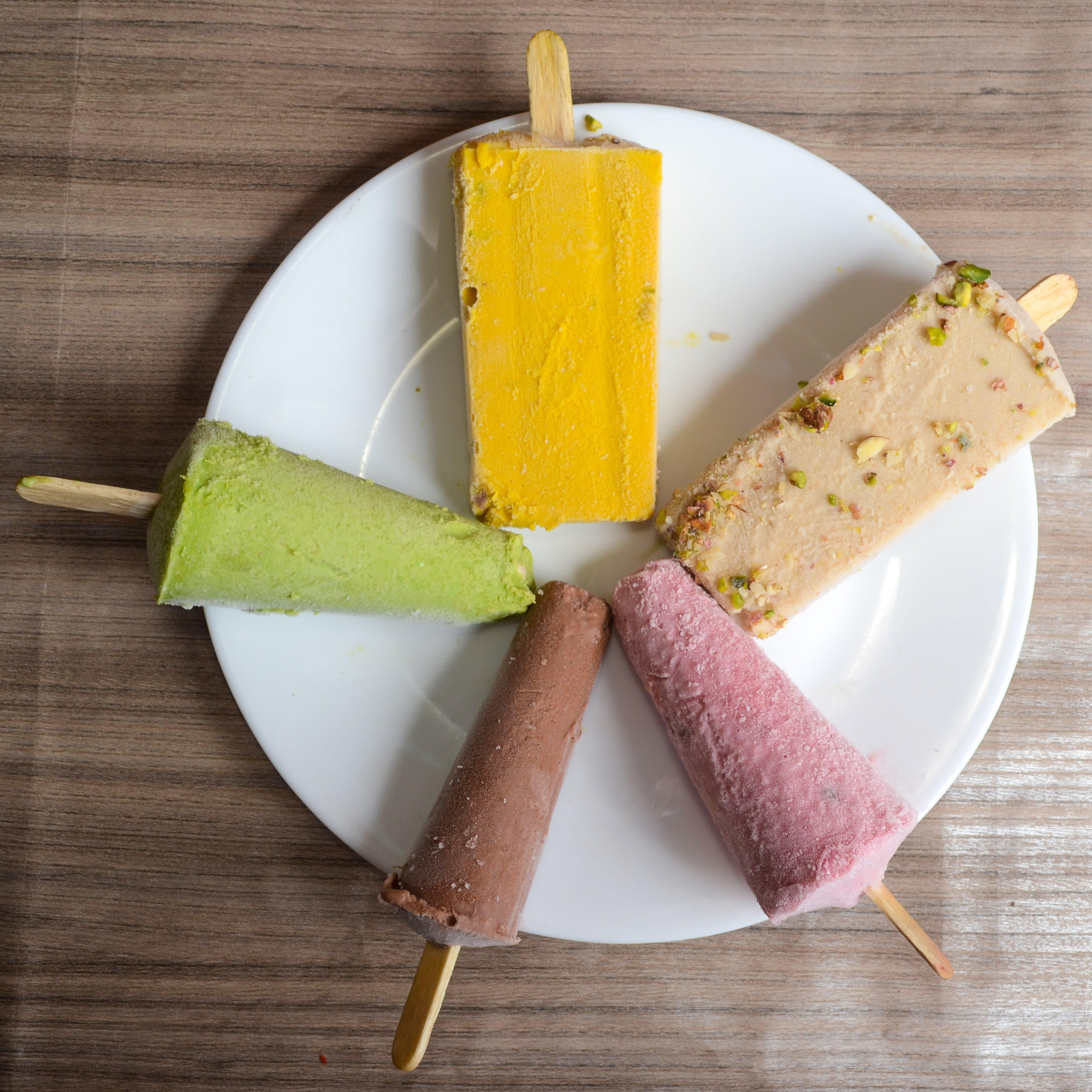 Him Cream Kulfi Parlour - Logo