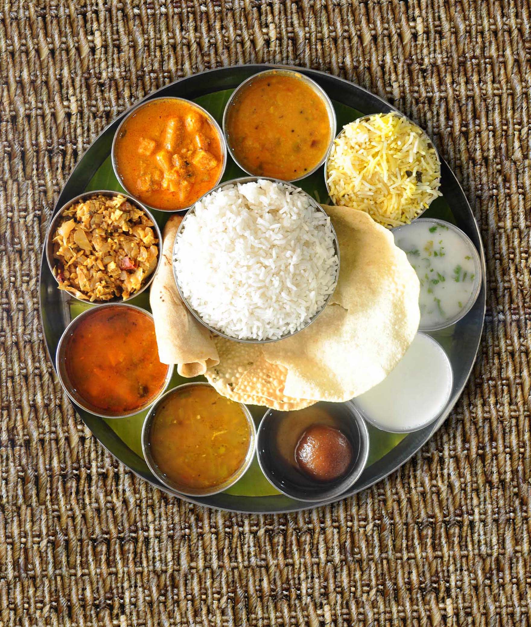 Hinduja Hotels Cafe & Restaurant - Logo