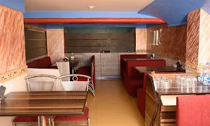 Hotel Mahesh - Logo