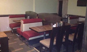 Hotel Prashanth Bar & Restaurant - Logo