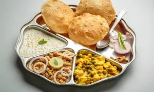 Hotel Tapasvi Veg Restaurant - Logo