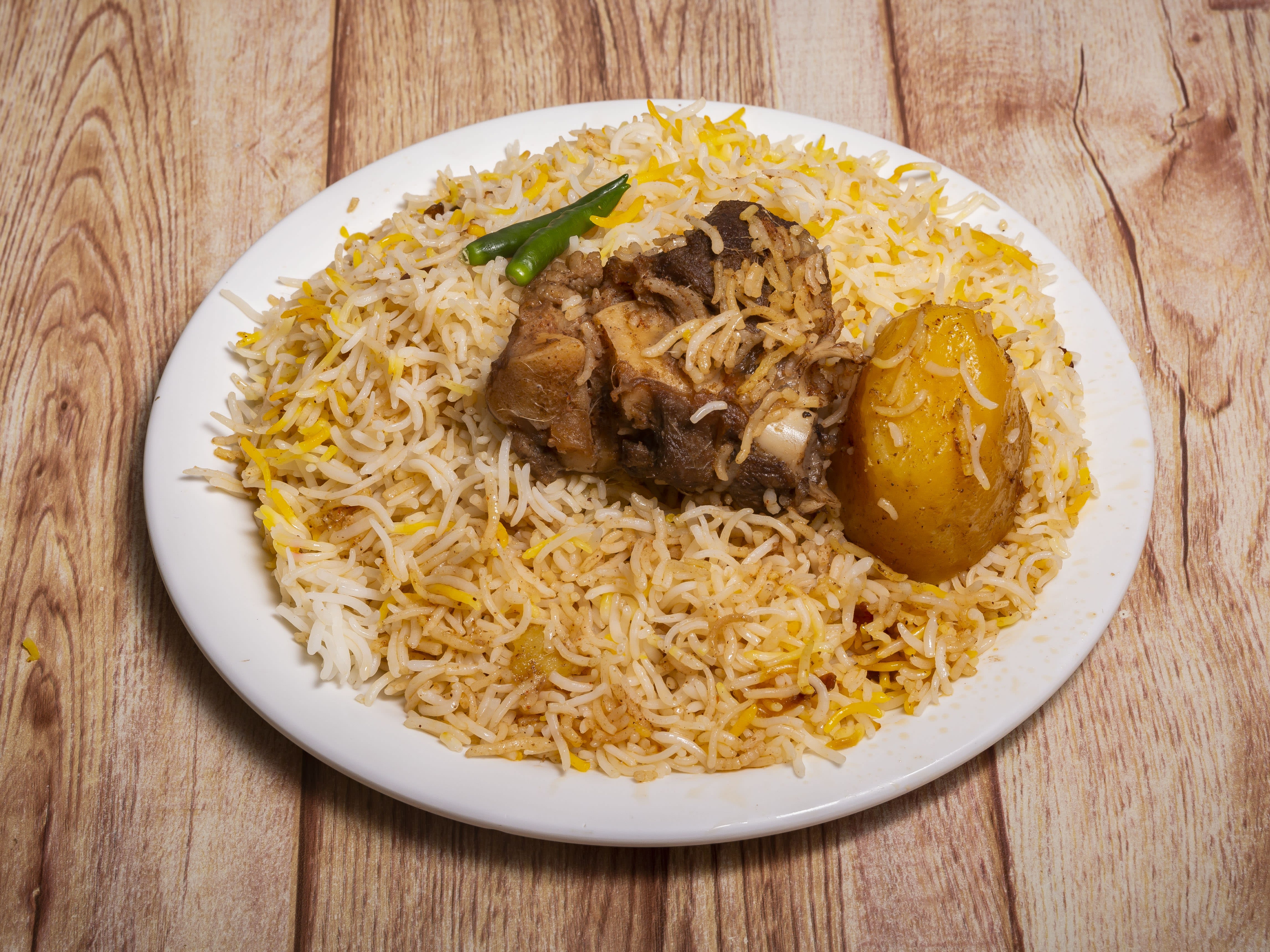 Hyderabadi Dum Biryani And Veg House - Logo
