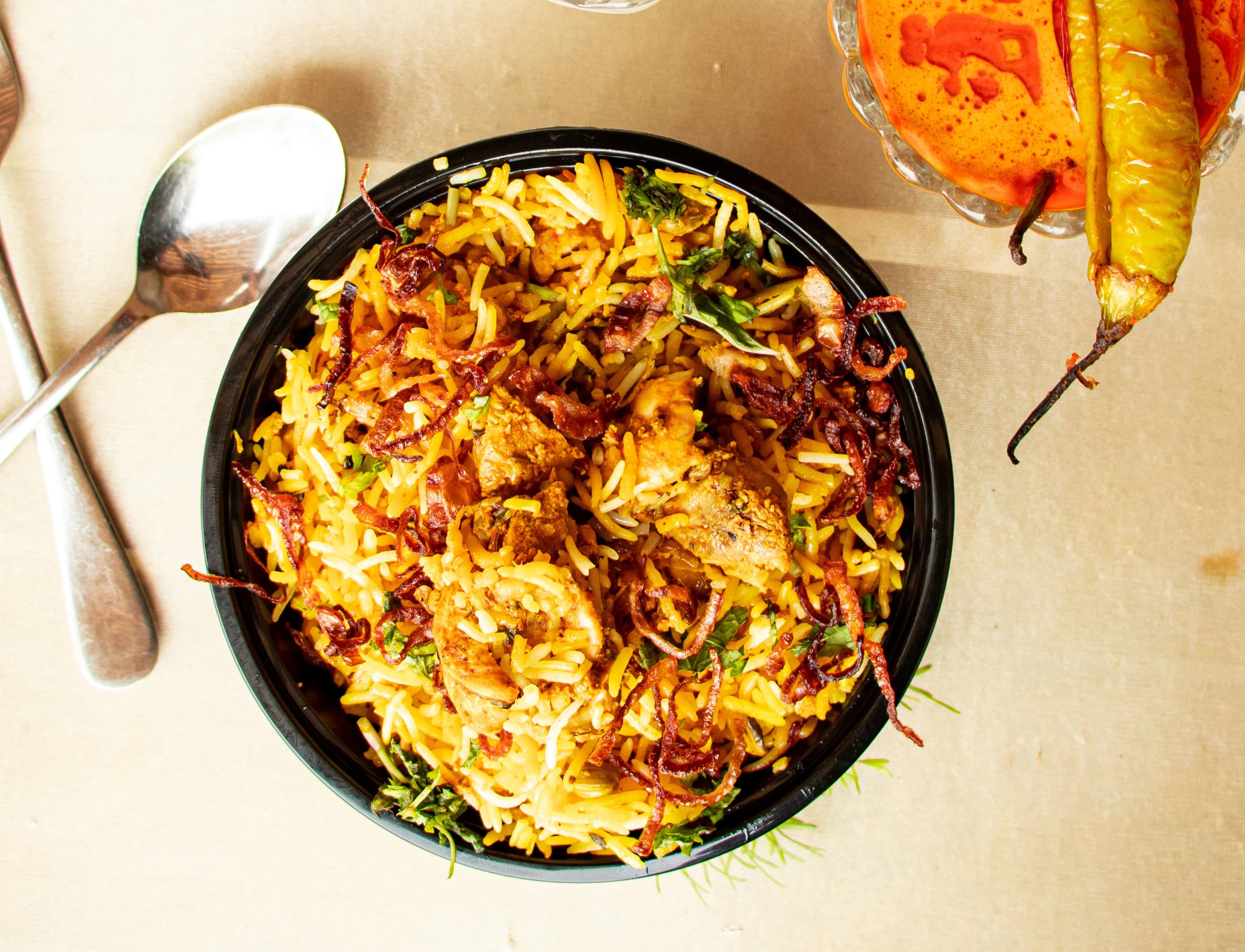 Hyderabdi king dum box Biryani - Logo