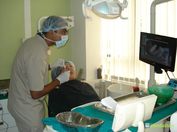 IVORIES DENTAL CLINIC & IMPLANT CENTER - Logo