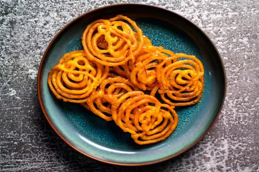 Jalebi Junction By Mohana Sweets ESTD. 1958 - Logo
