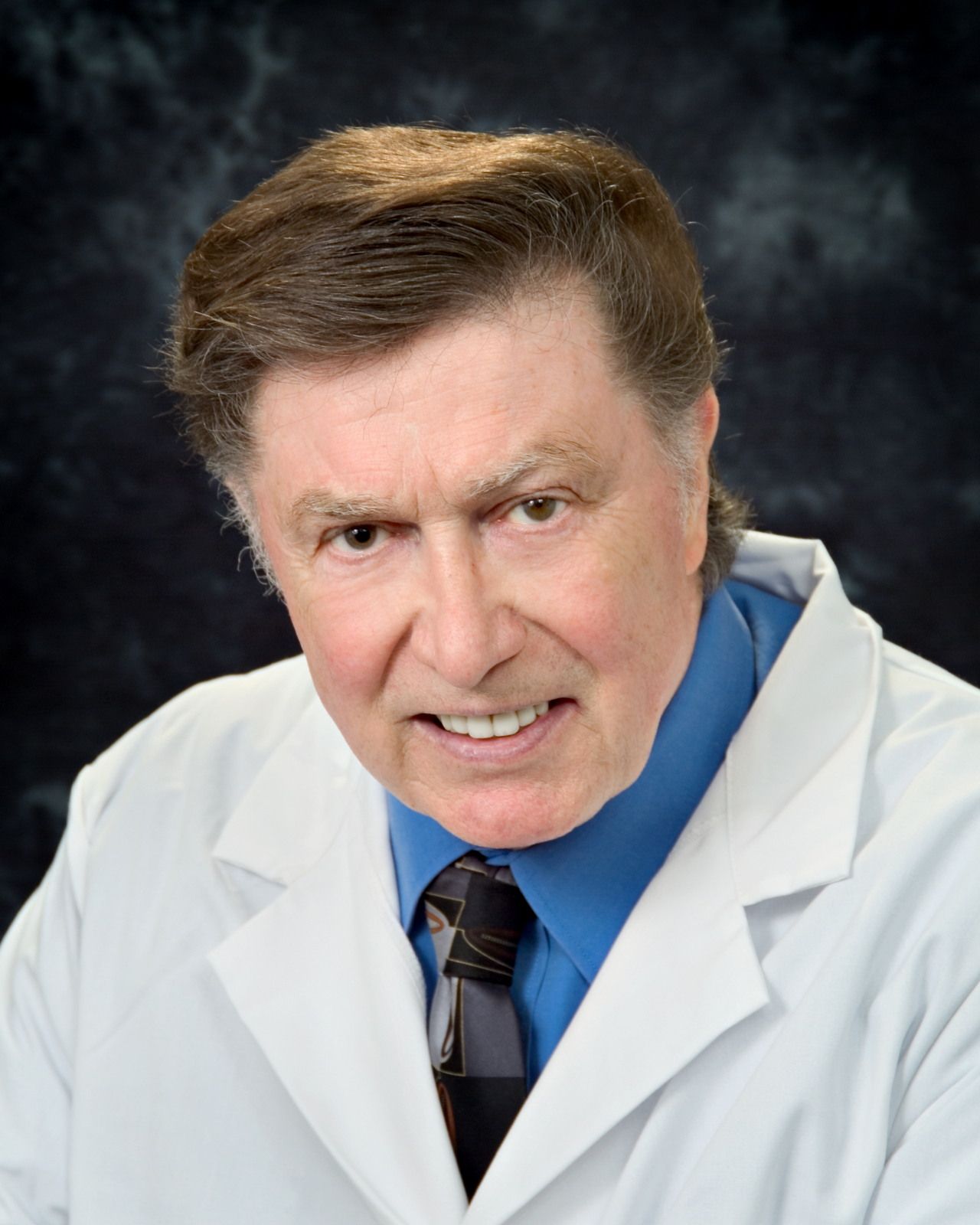 James A. Likins Denture Clinic - Logo