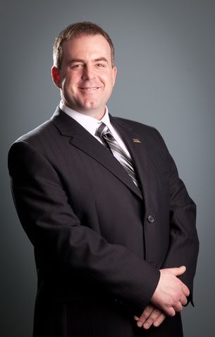 Jason McNally - EXIT Realty - Logo