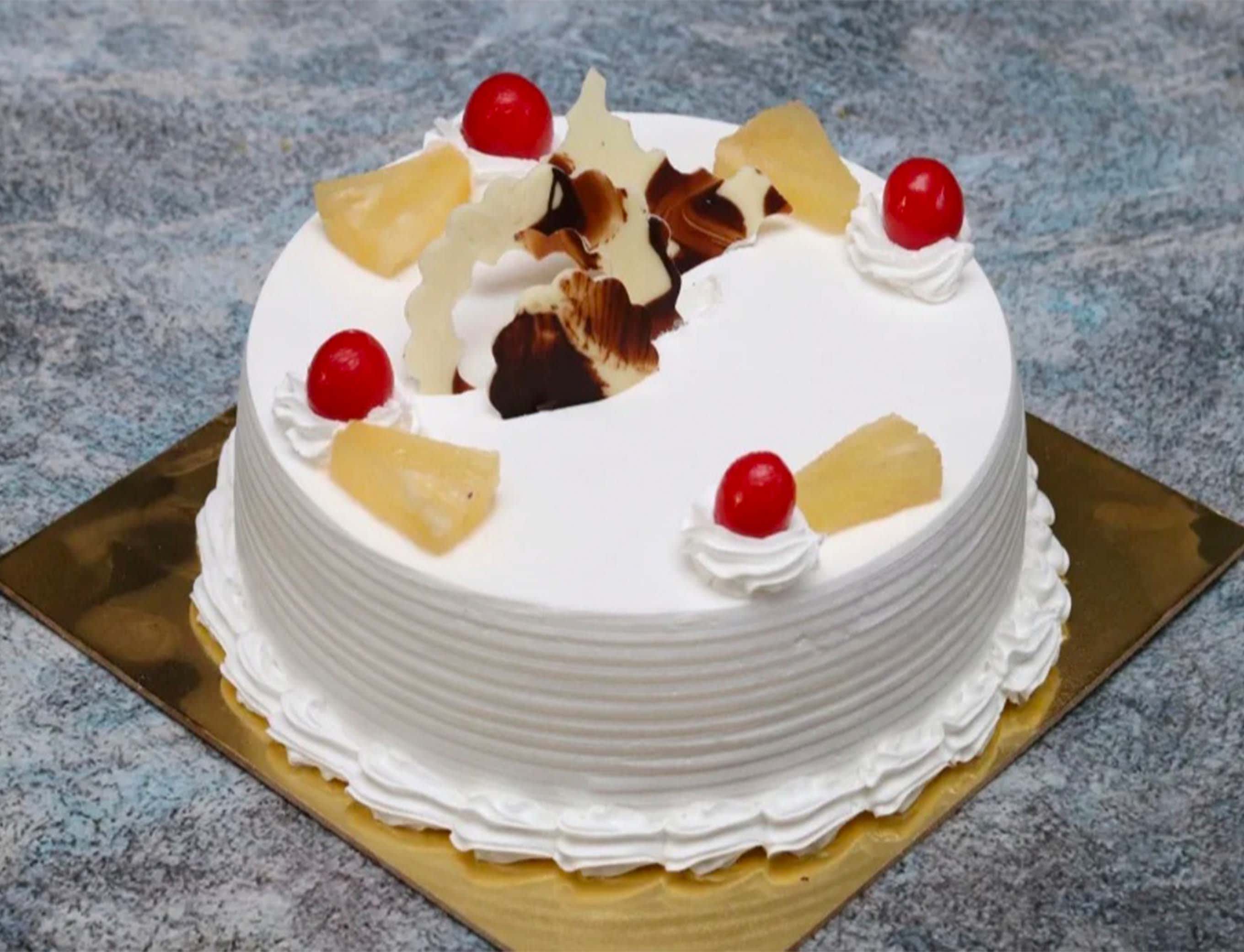 J.J.C. THE CAKE SHOP - Logo