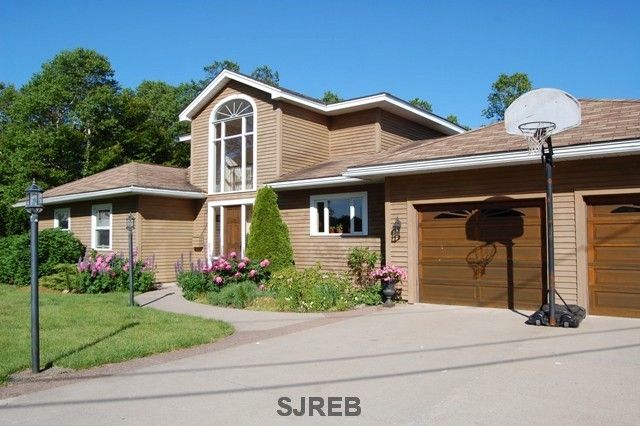 Judy Mitchell - Re/Max Professionals Saint John - Logo