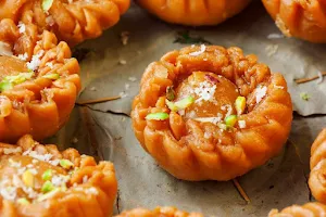 Juna Muliwala Sweets Ahmedabad - Logo