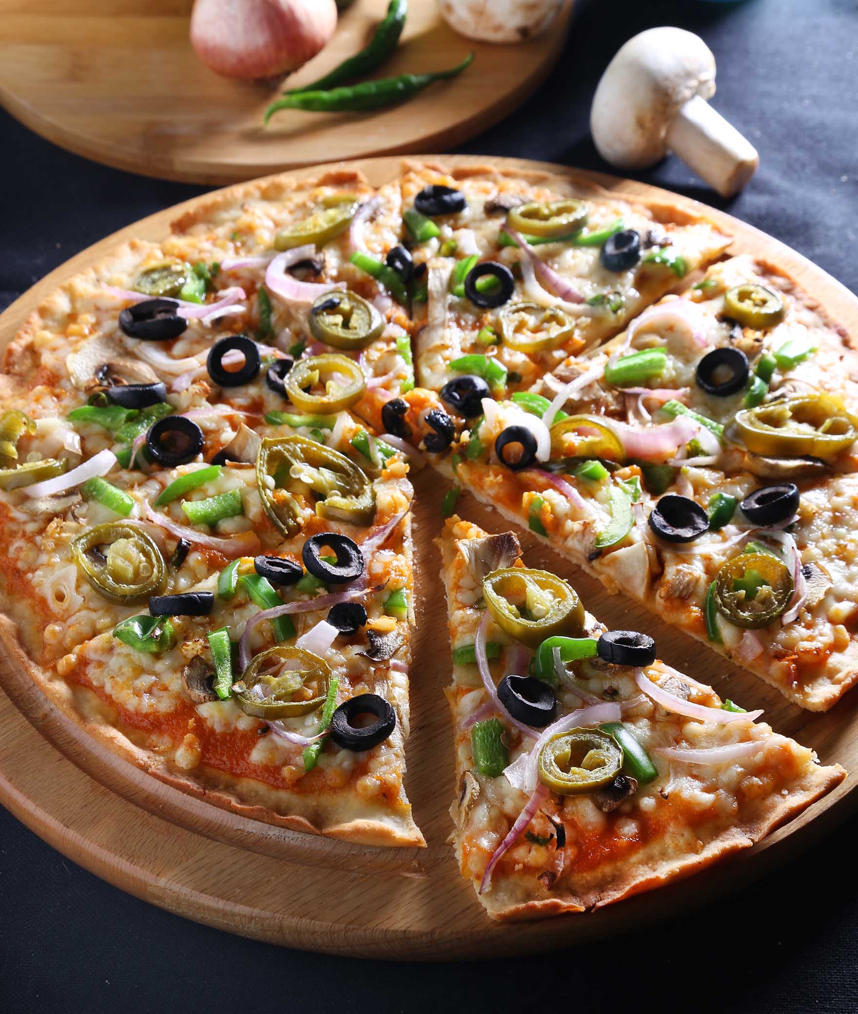 Juno's Pizza by EatFit - Baking Fresh Since 1974 - Logo