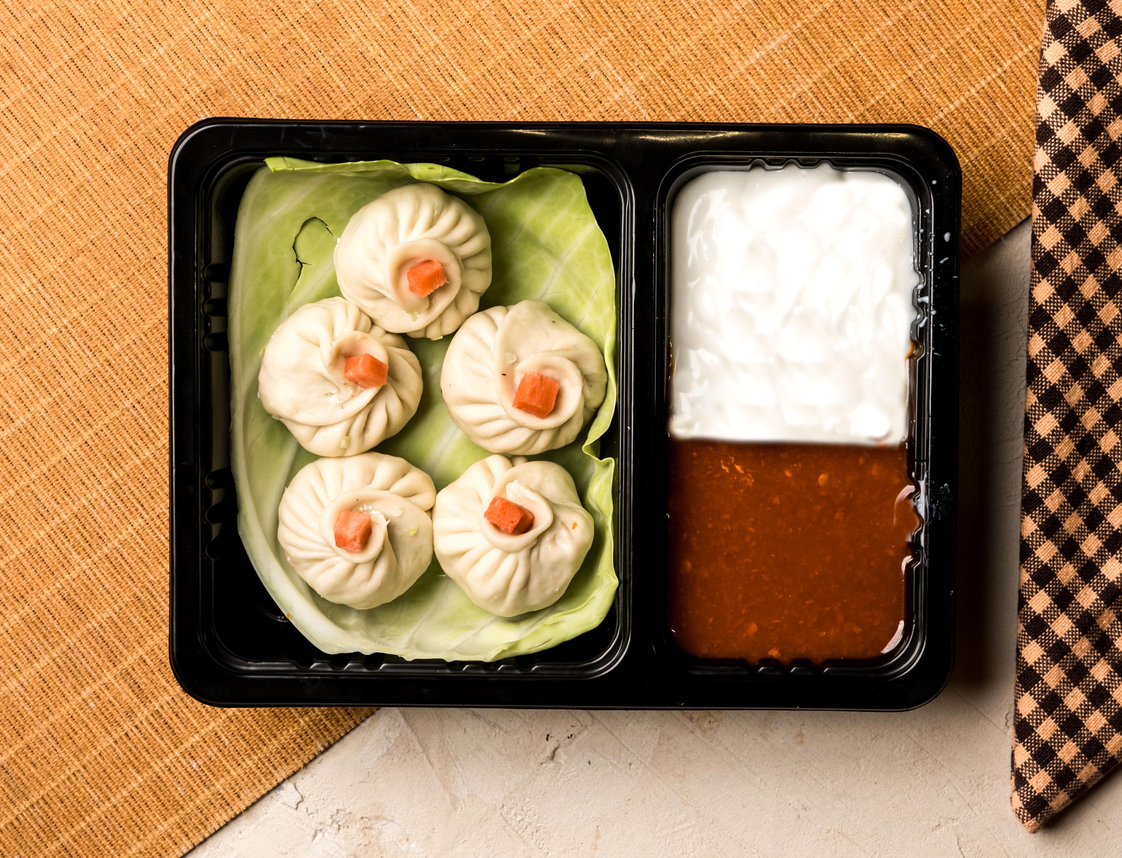 K-9 Yummy Momos Centre - Logo