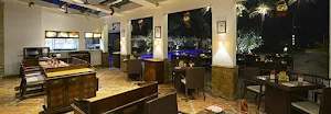 Kabab Hut - Hotel Sun N Sand - Logo