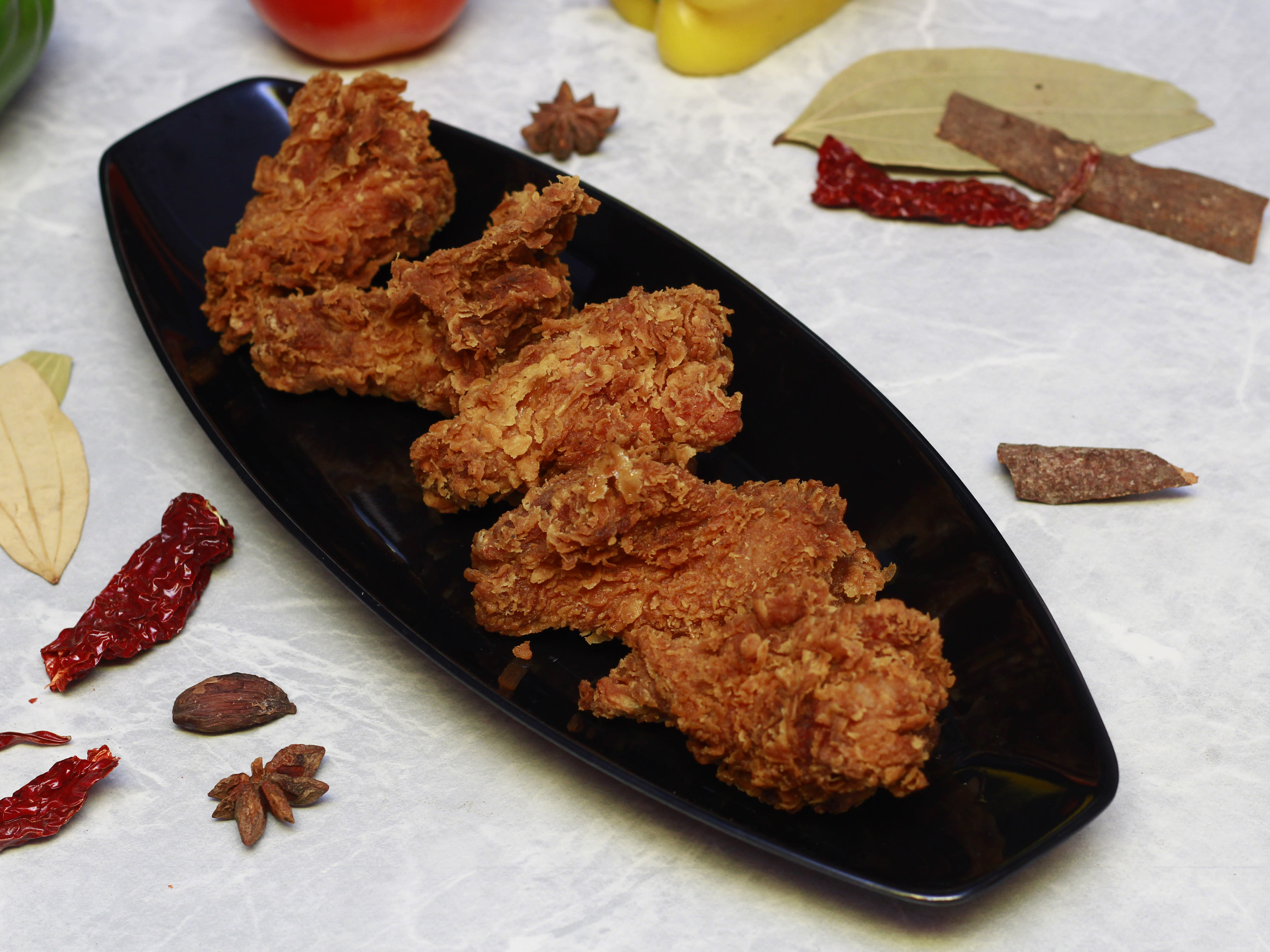 Kaju chicken pakodi center - Logo