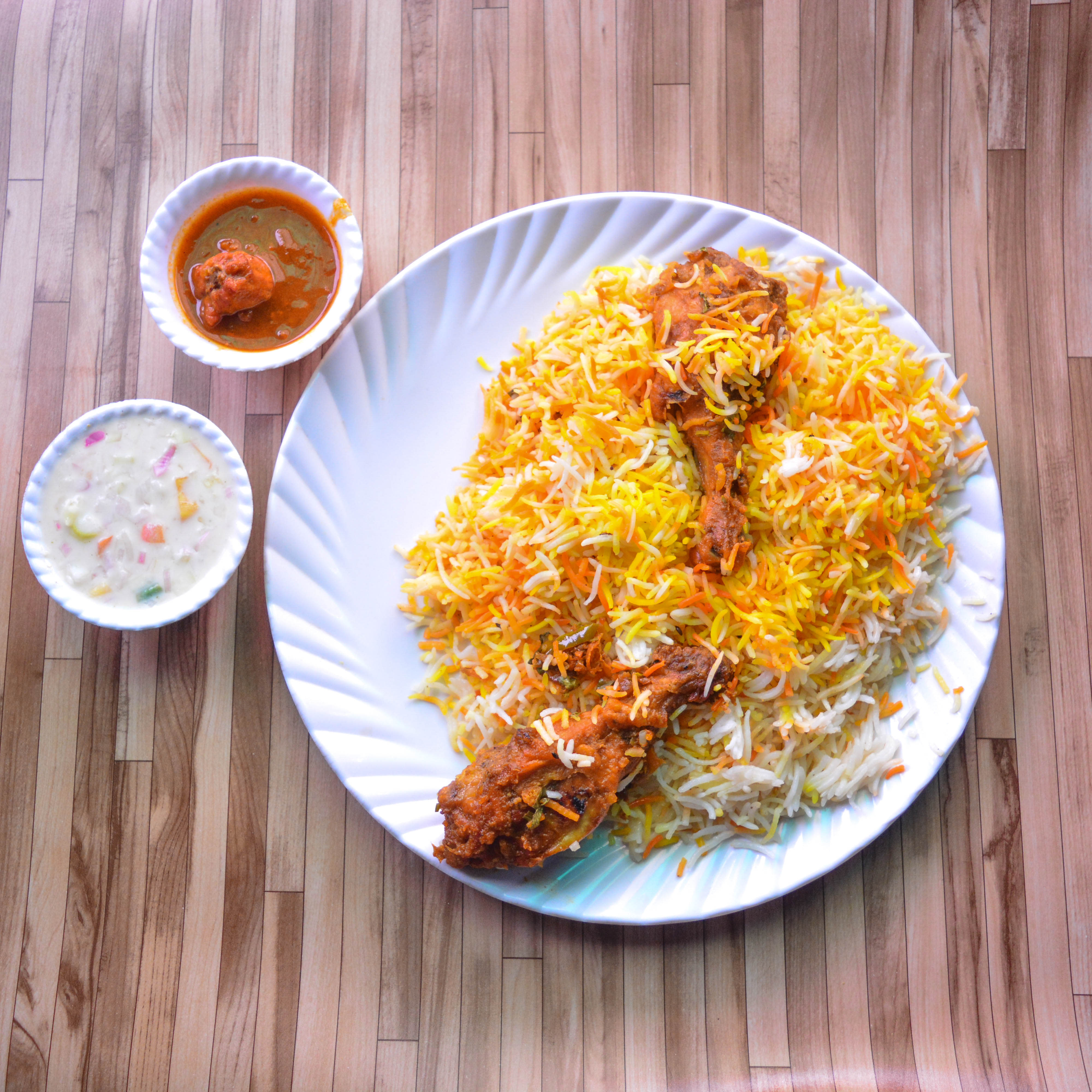 Kaka Chicken Biryani - Logo