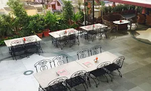 Kalyan Rooftop And Indoor Restaurant - Logo