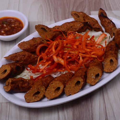 Kamini Restaurant - Logo