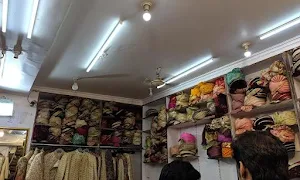 Kanwar Ji Golya Safa Sherwani - Logo