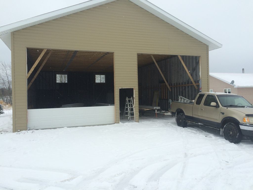 KCE Garage Doors &a; Renovations - Logo