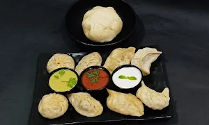 Kevin’s Dumplings & Grill - Logo