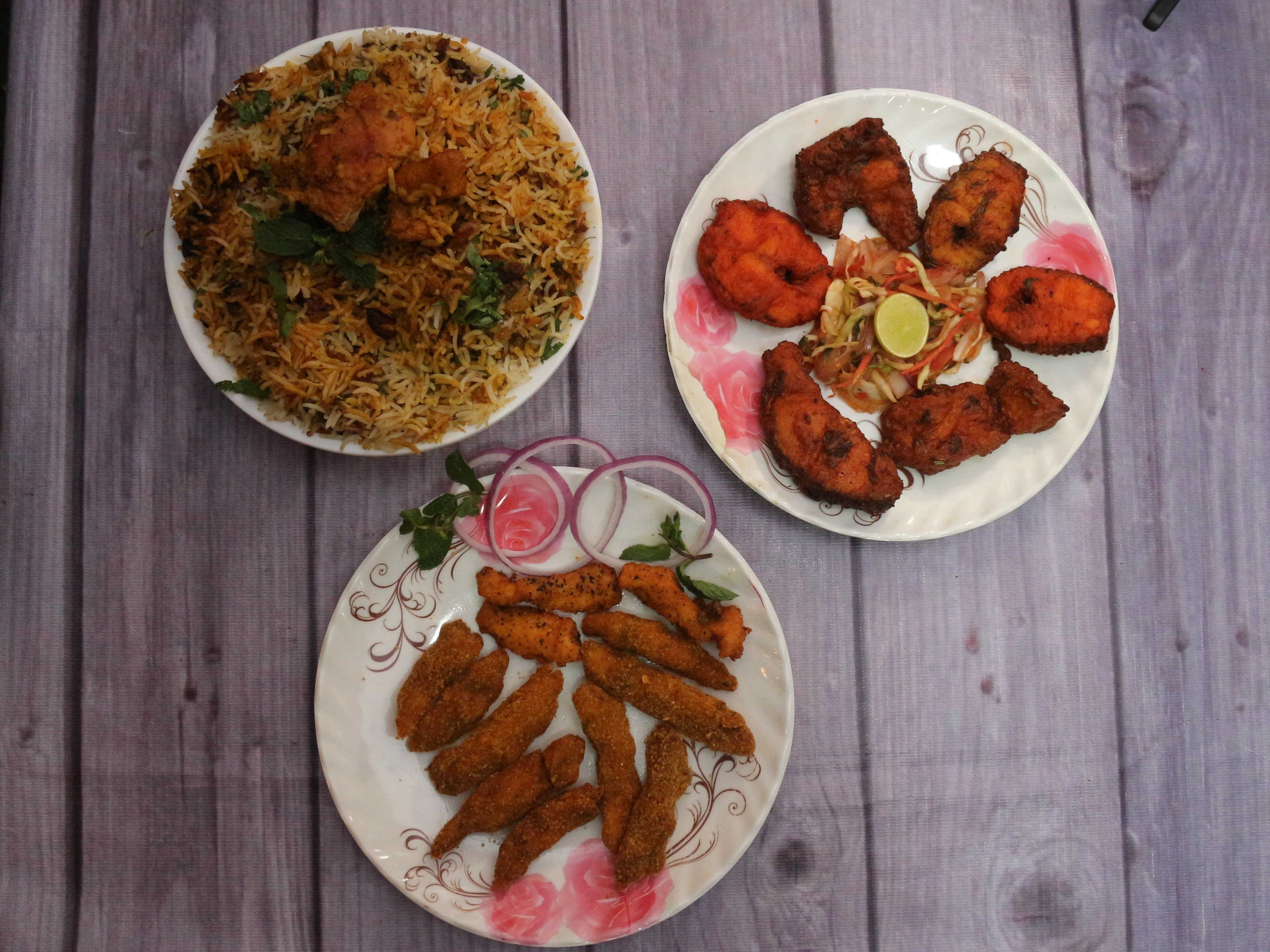 Khamaz The House Of Biryani - Logo