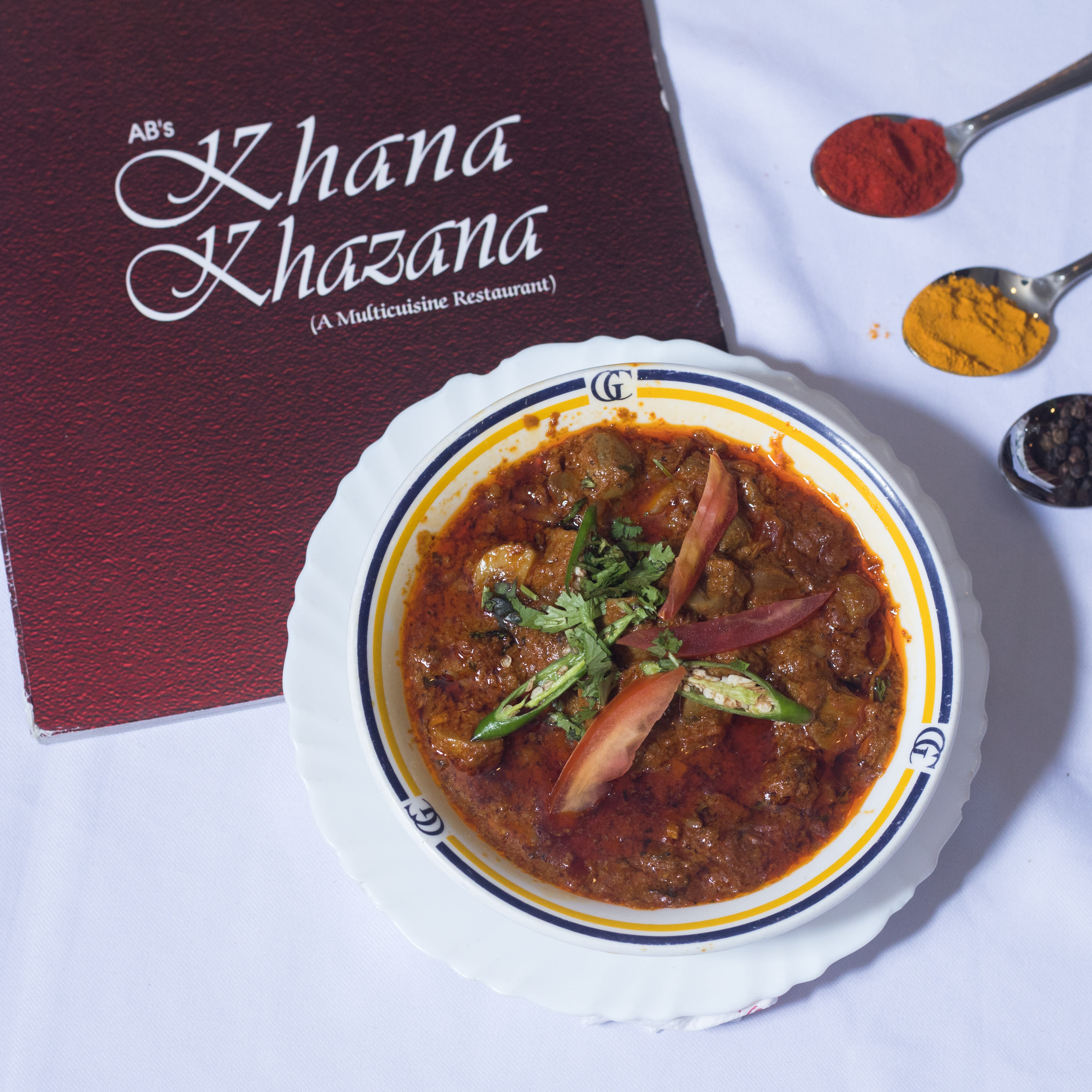 Khana Khazana Restaurant- Hotel Grand Continental - Logo
