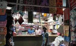 Kishore Fabrics - Logo
