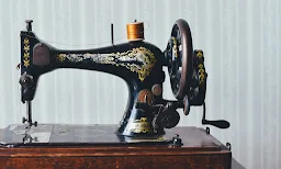 K M Tailors - Logo