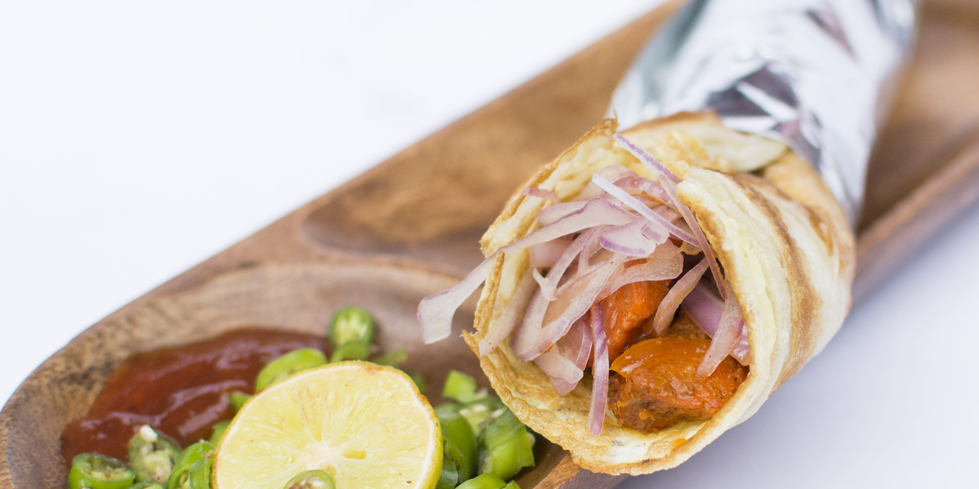 KOLKATA FAMOUS KATI ROLL - Logo
