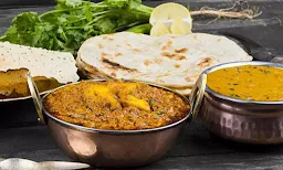 Komal Punjabi Dhaba - Logo