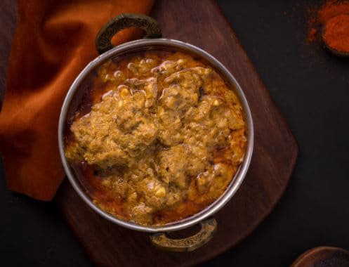 Kulambu kadai ( Madhus Home made curry hub) - Logo