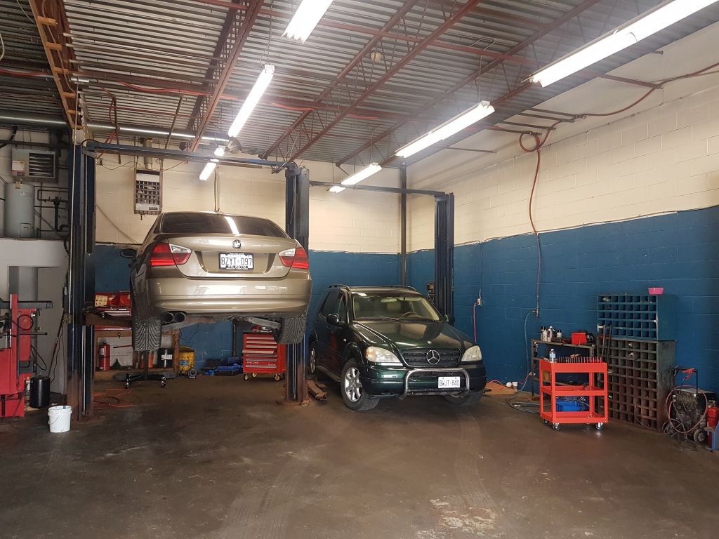 Kurdi Auto Mechanic - Logo