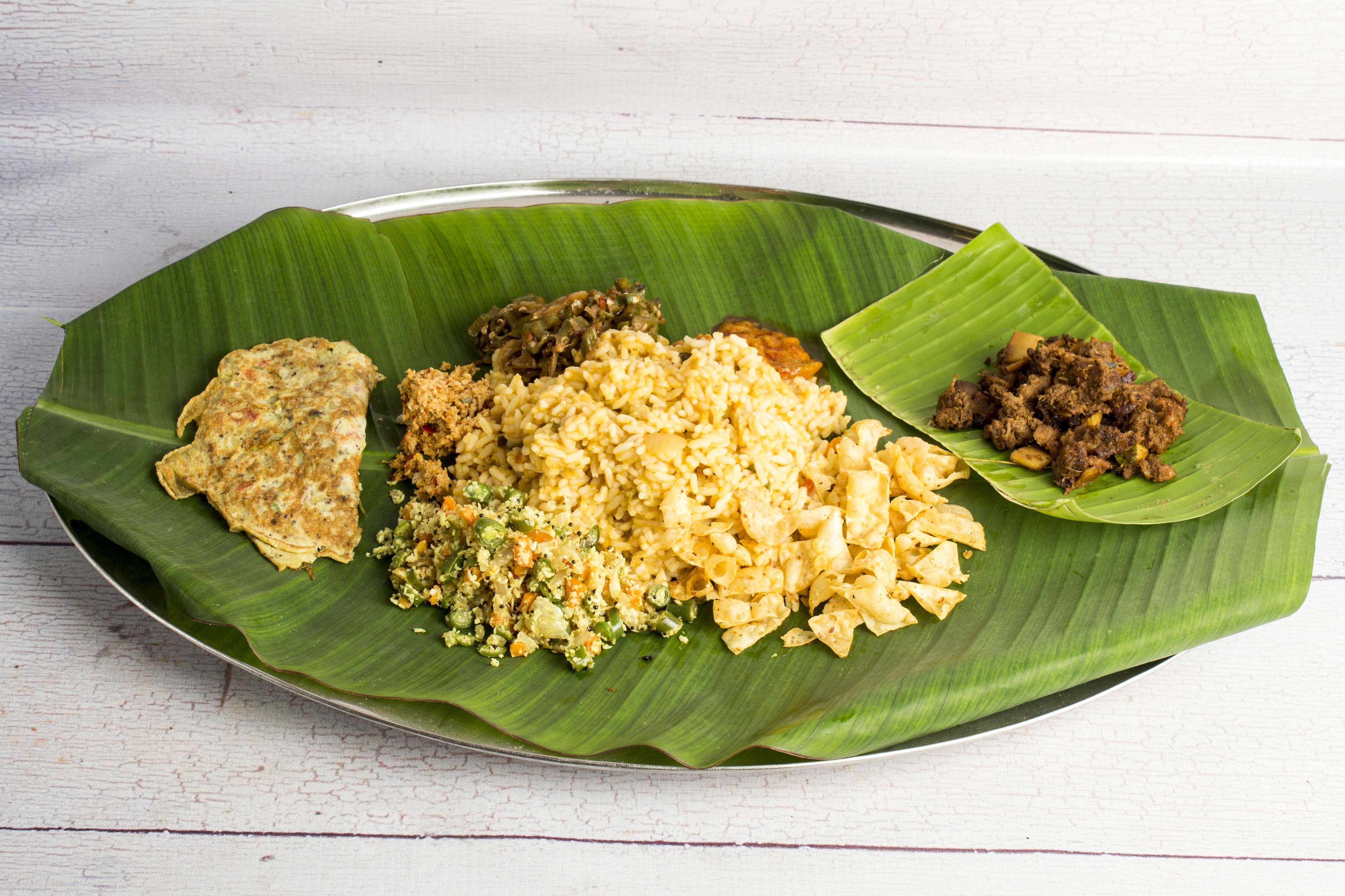 Kuttanadan Restaurant - Logo