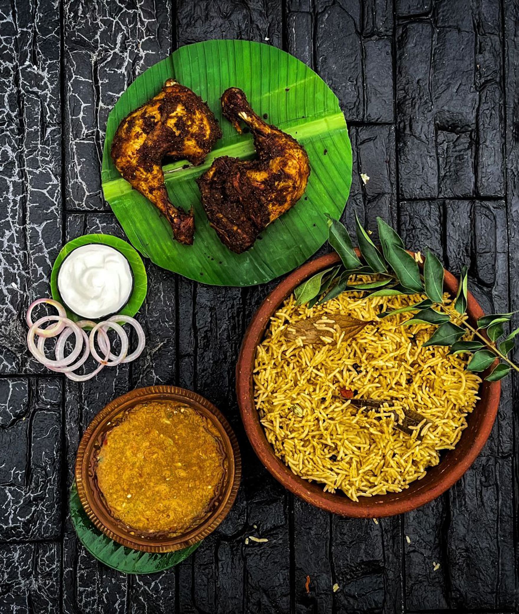 KUZHI MANDI - Logo