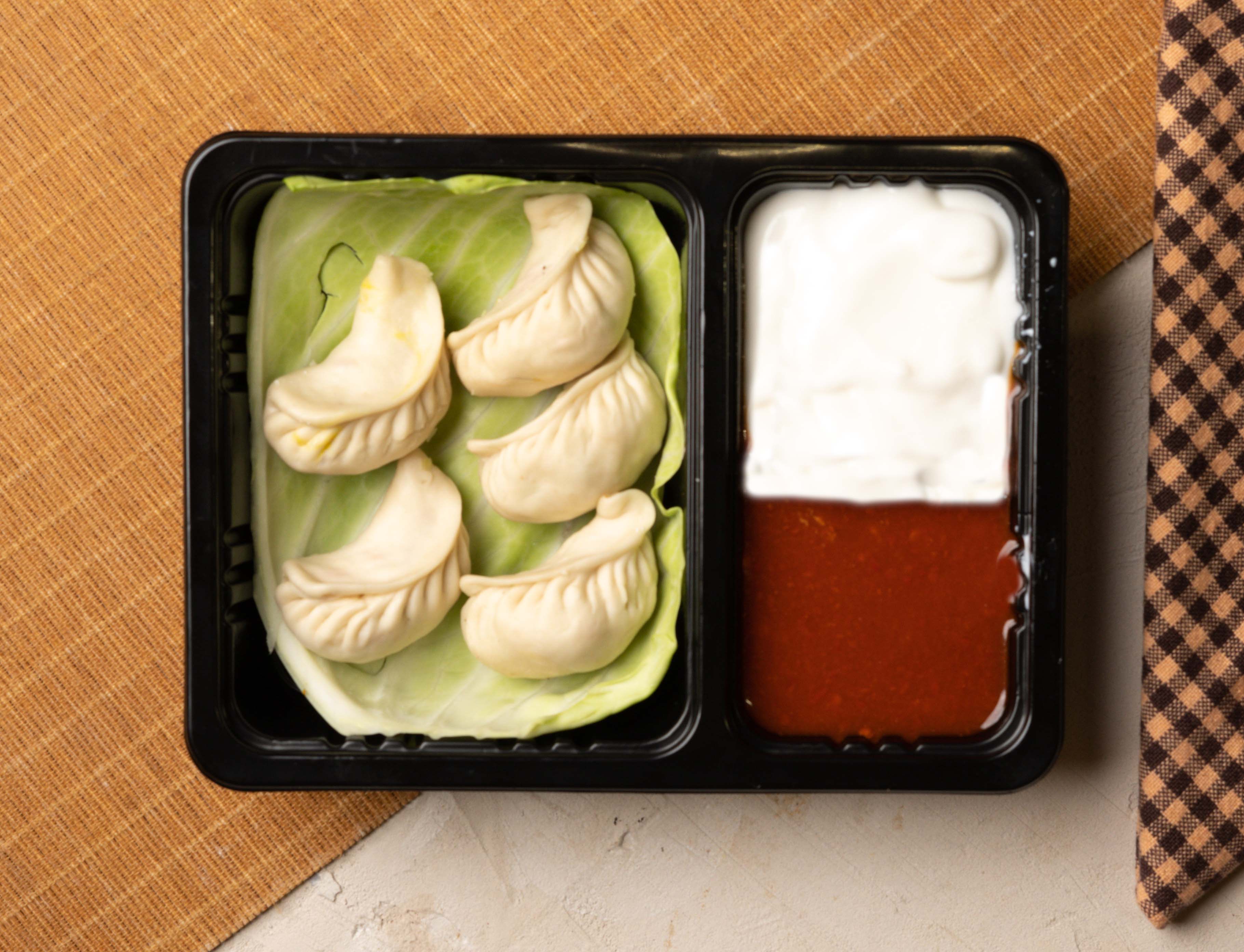 Kwality momos & chaap - Logo
