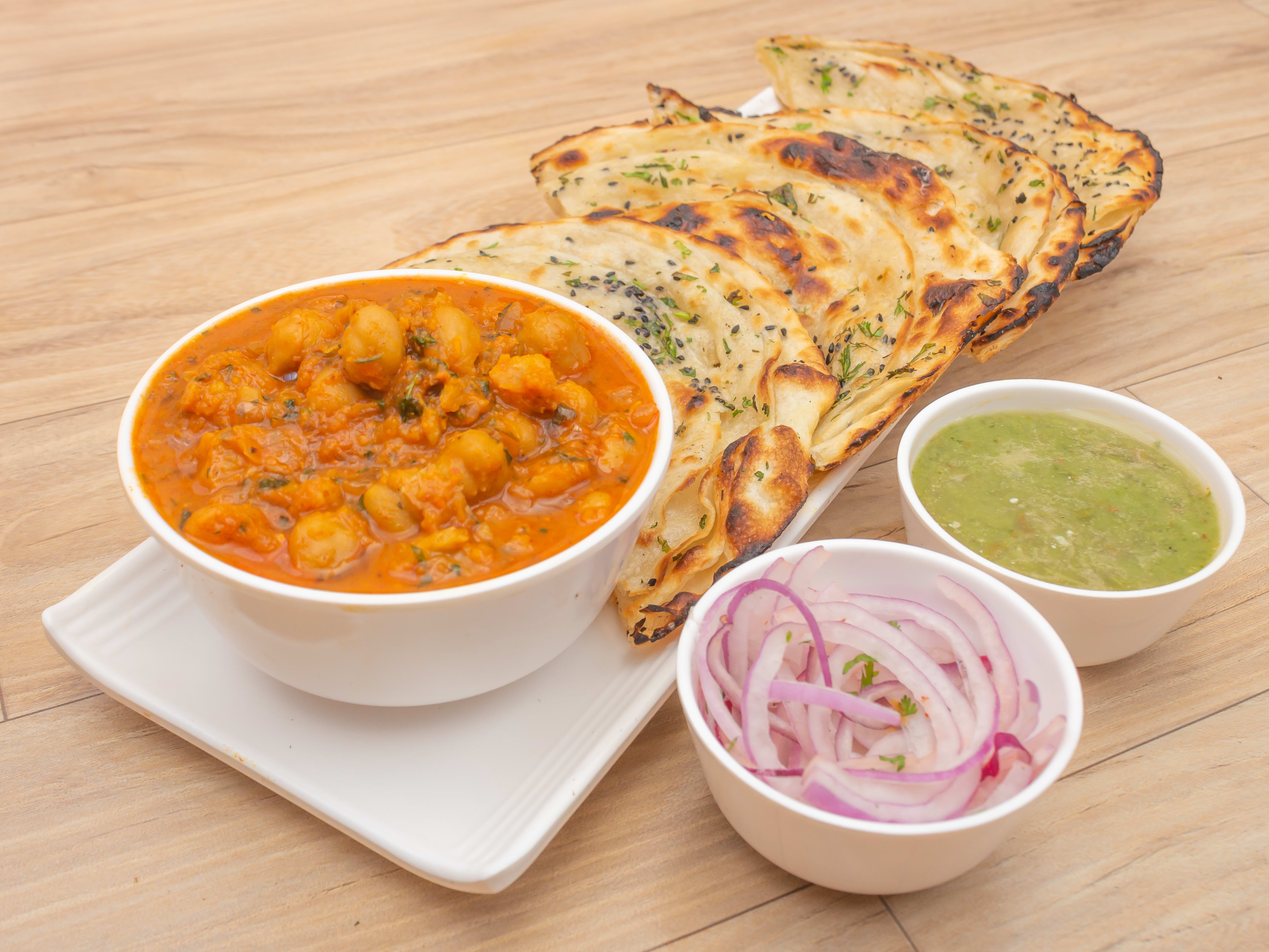 Lajwaab Chole Kulche - Logo