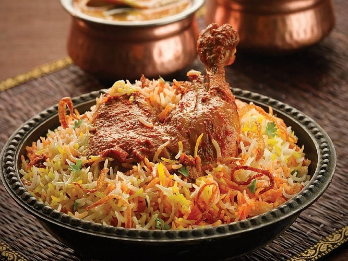 Lakhnawi (Awadh)Chicken Biryani - Logo