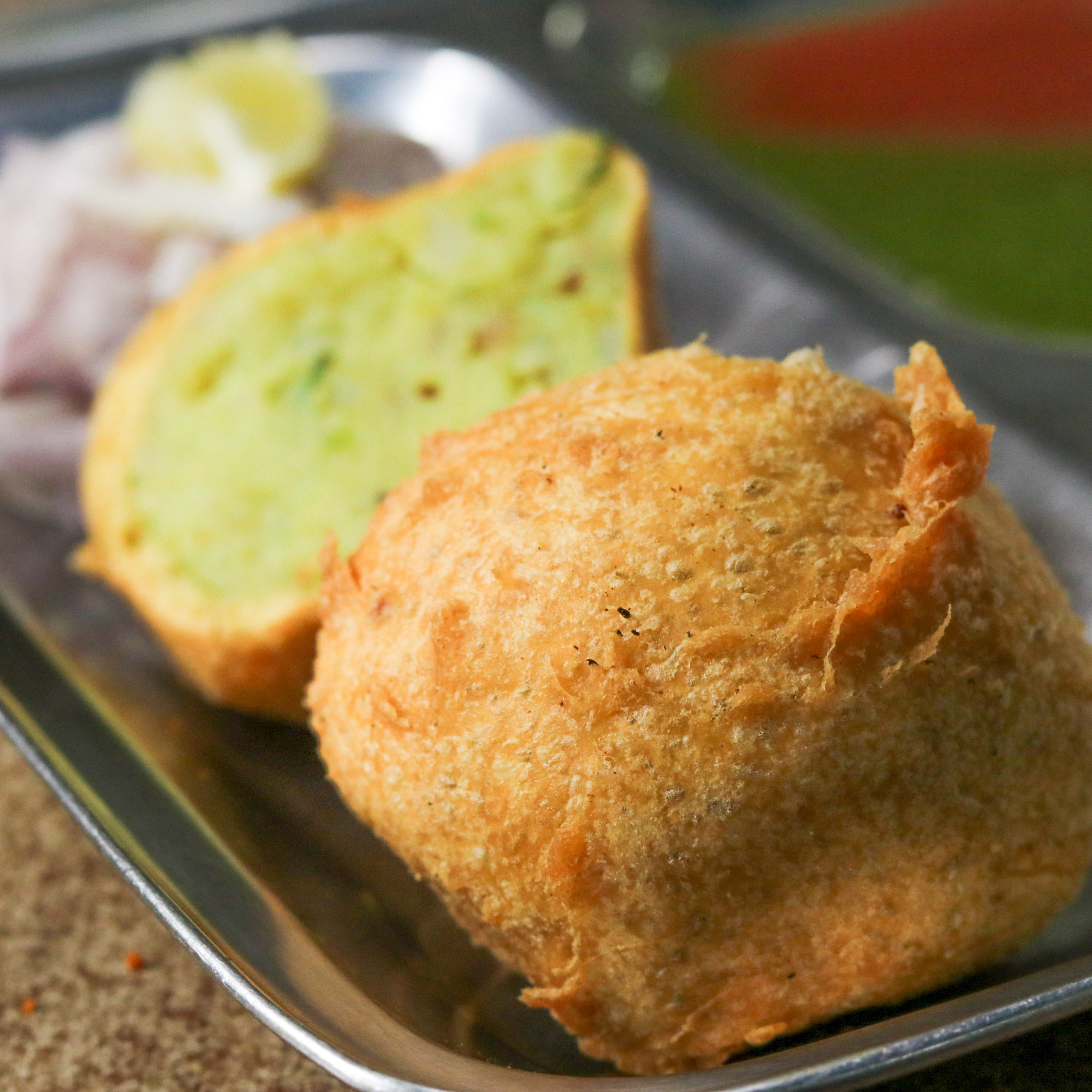 Laxman's Om Vada Pav - Logo