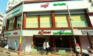 Laxmi Veg Restaurant - Logo